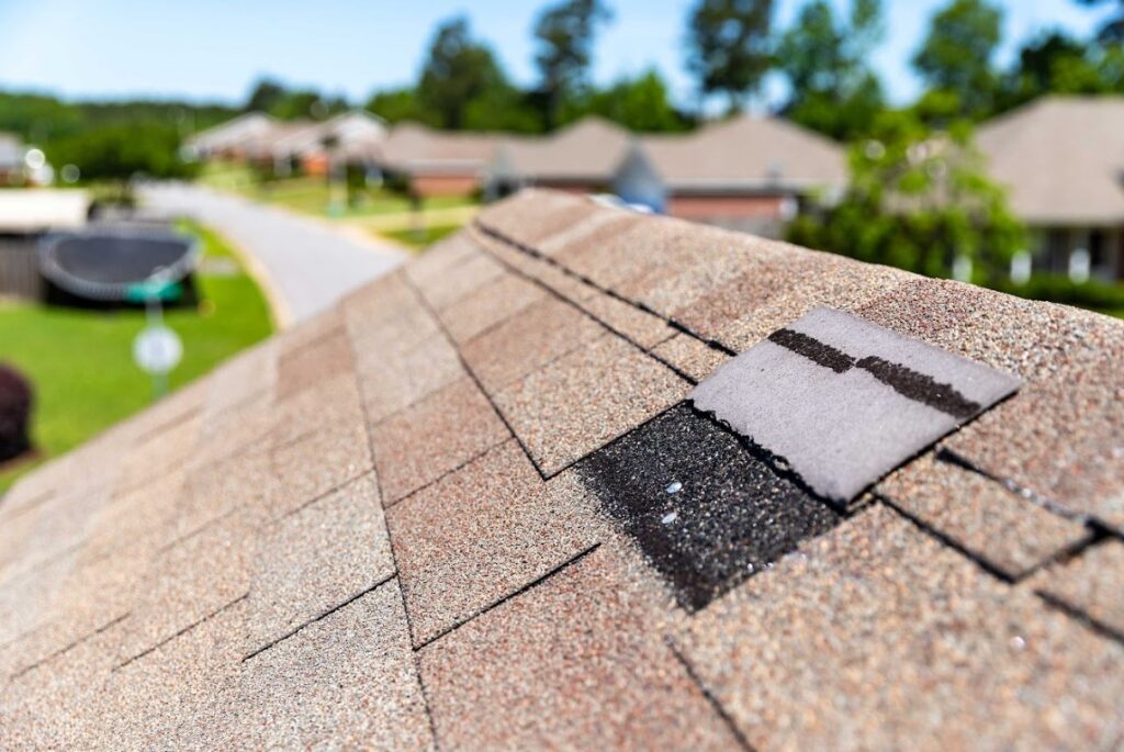 wind roof damage sign