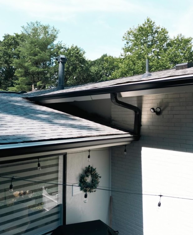 gutter downspout positioning